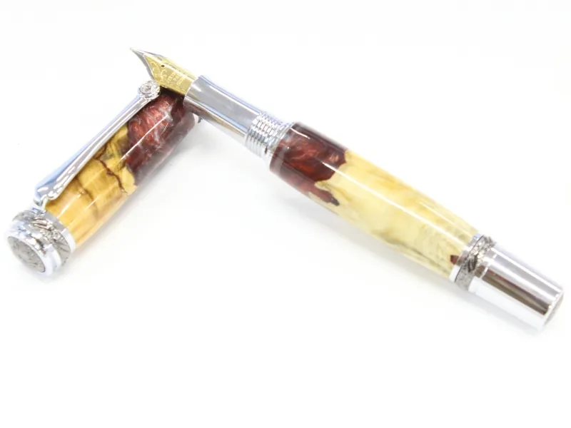 Majestic fountain pen in buckeye burl and silver red resin hybrid with chrome and gun metal trim