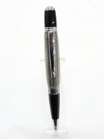 Mesa style pen with chrome trim and a braided stainless steel barrel in clear resin