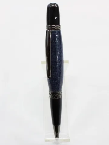 Mesa style pen with gun metal trim and a denim barrel cast in clear resin