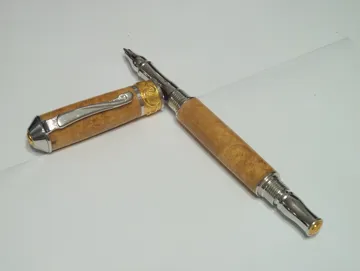 Nouveau sceptre rollerball in maple burl with gold and rhodium trim