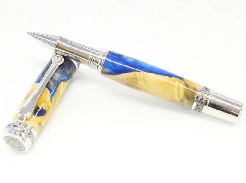Majestic rollerball in buckeye burl and silver blue resin hybrid with rhodium and black titanium nitride trim