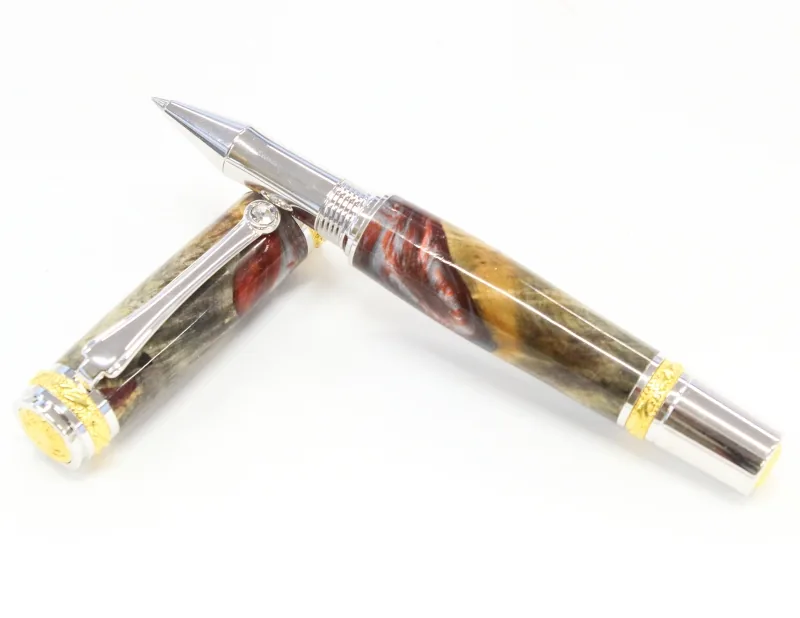 Majestic rollerball in buckeye burl and silver blue resin hybrid with rhodium and 22kt gold trim