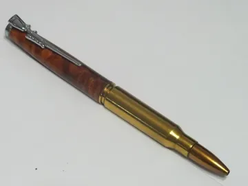 .308 rifle cartridge pen in redwood with a chrome clip and cap