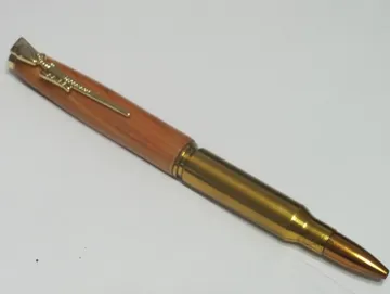 .308 rifle cartridge pen in cedar with a 24kt gold clip and cap