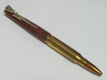 .308 rifle cartridge pen in redwood with a 24kt gold clip and cap