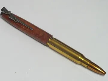 .308 rifle cartridge pen in redwood with a gun metal clip and cap