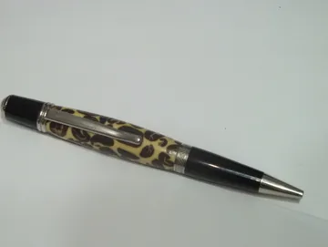 Sierra pen finished in rhodium with a barrel of coffee beans cast in resin