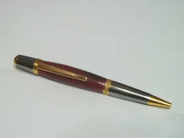 Sierra pen finished in 24kt gold and black titanium nitride with a cast resin barrel