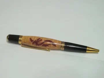 Sierra pen finished in gold titanium nitride with a dragon inlay barrel