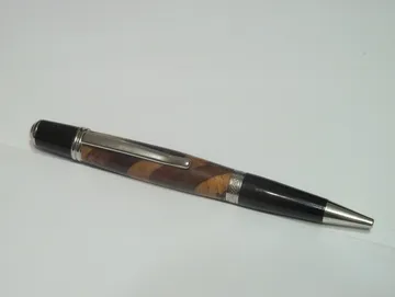 Sierra pen finished in rhodium with a herringbone wood barrel