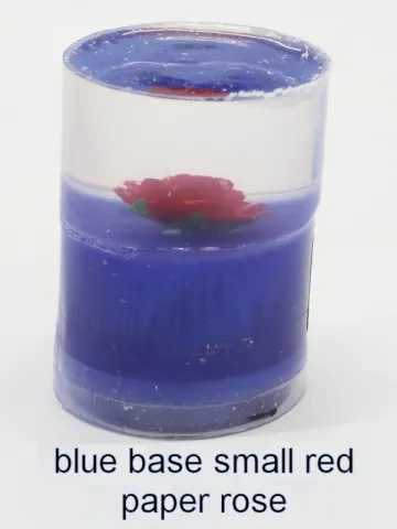 Bottle stopper blank with a red paper rose over a blue base