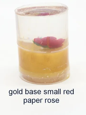 Bottle stopper blank with a red paper rose over a gold base