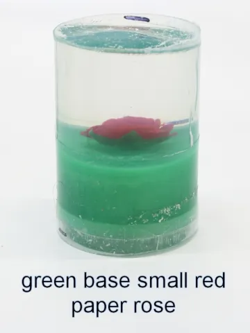 Bottle stopper blank with a red paper rose over a green base