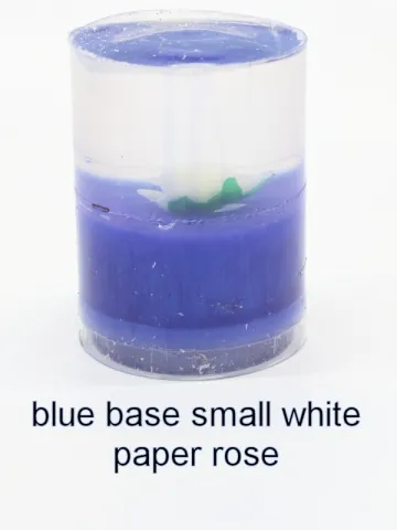 Bottle stopper blank with a white paper rose over a blue base
