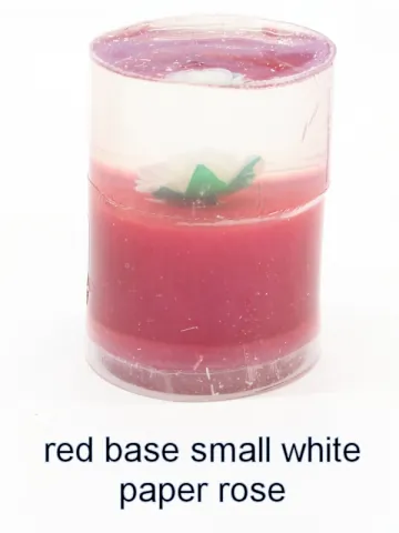 Bottle stopper blank with a white paper rose over a red base