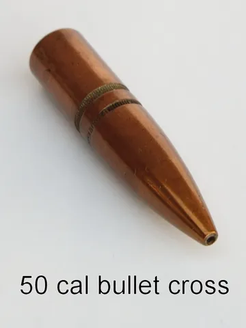 Powder-coated .50 caliber copper bullet drilled for a Cross refill