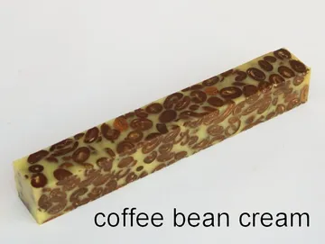 Pen blank of coffee beans suspended in cream resin