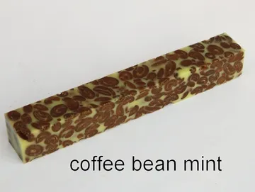 Pen blank of coffee beans suspended in mint resin