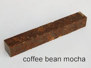 Pen blank of coffee beans suspended in mocha resin