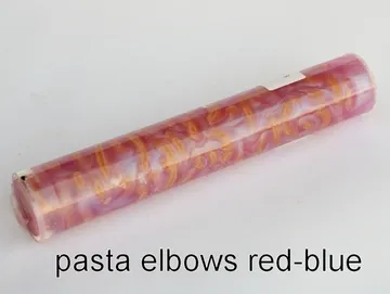 Pen blank of elbow pasta suspended in red and blue resin