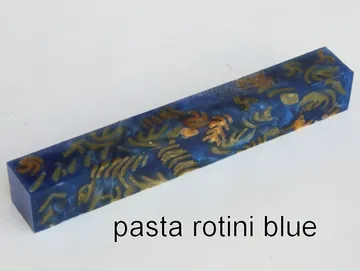 Pen blank of tri-colored rotini pasta suspended in blue resin