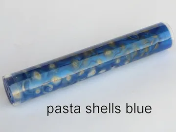 Pen blank of mini shell pasta suspended in blue resin