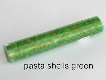 Pen blank of mini shell pasta suspended in green resin