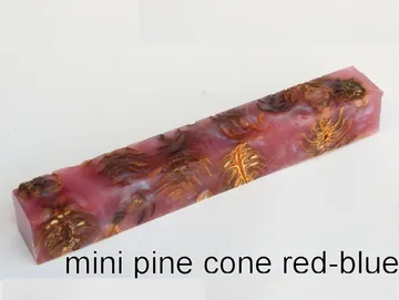 Pen blank of mini pine cones suspended in red and blue resin